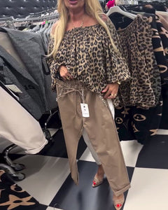 Blusa elegante com padrão leopardo de um ombro só