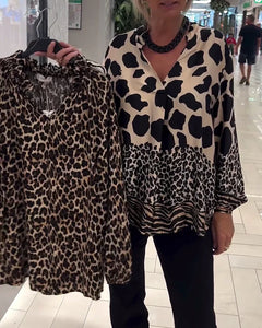 Blusa casual com padrão leopardo e decote em V