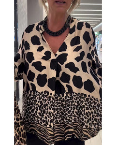 Blusa casual com padrão leopardo e decote em V